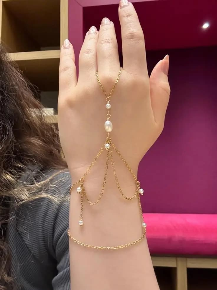 Elegant Golden Hand Chain Bracelet with White Pearls in Airport Road, Sambrial