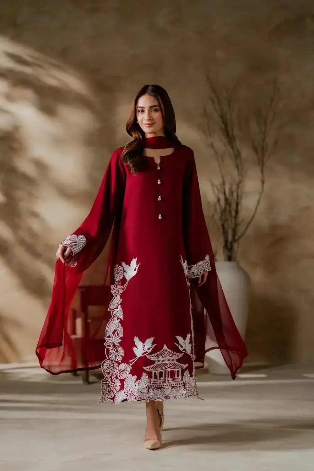 Elegant Maroon 3 pcs women’s stitched linen suit with embroidered details in Lahore